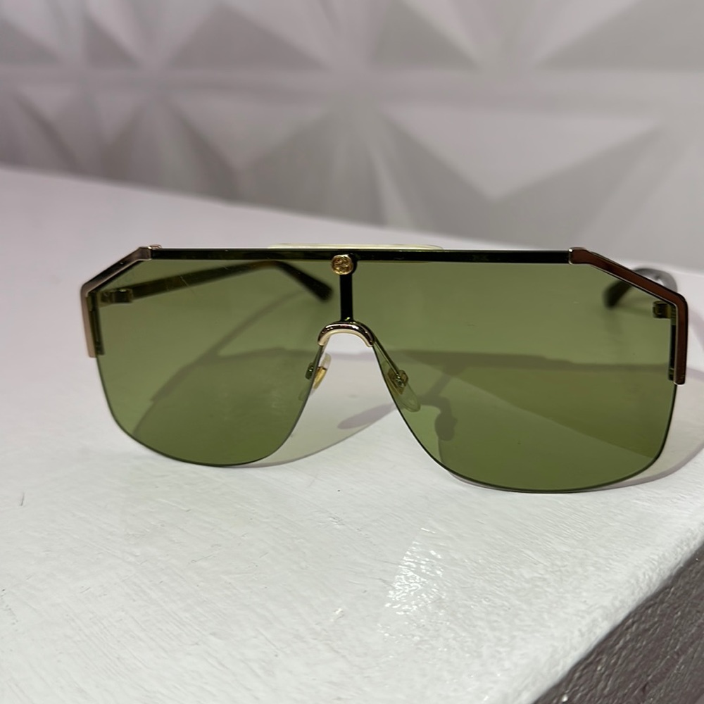 Gucci unisex green tint turtle shell frame